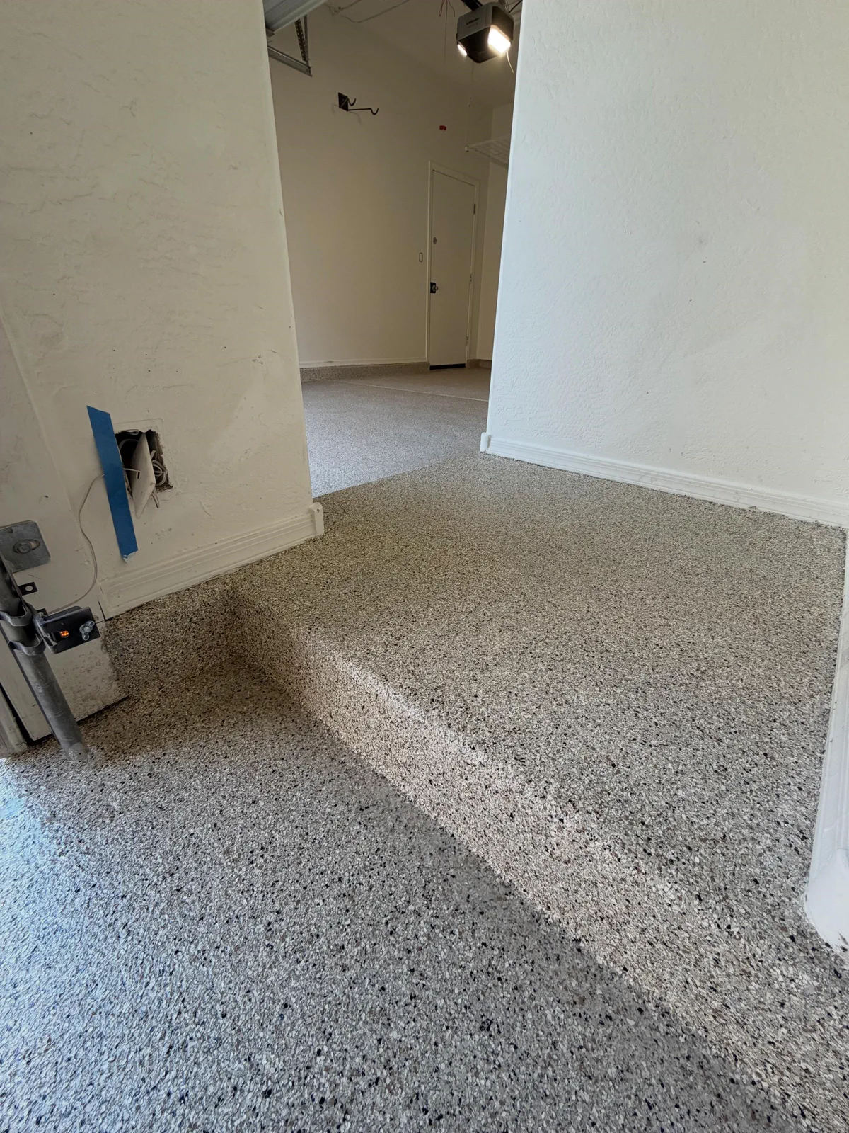 Close view of the finished decorative flake garage floor coating