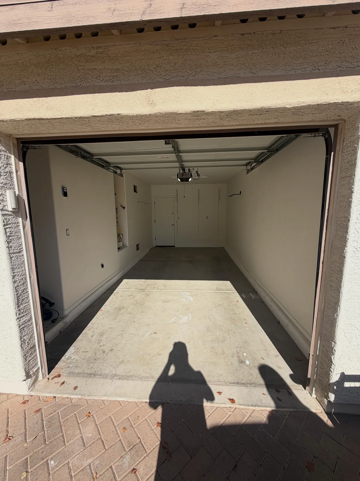 Uncoated garage floor before the floor coating project
